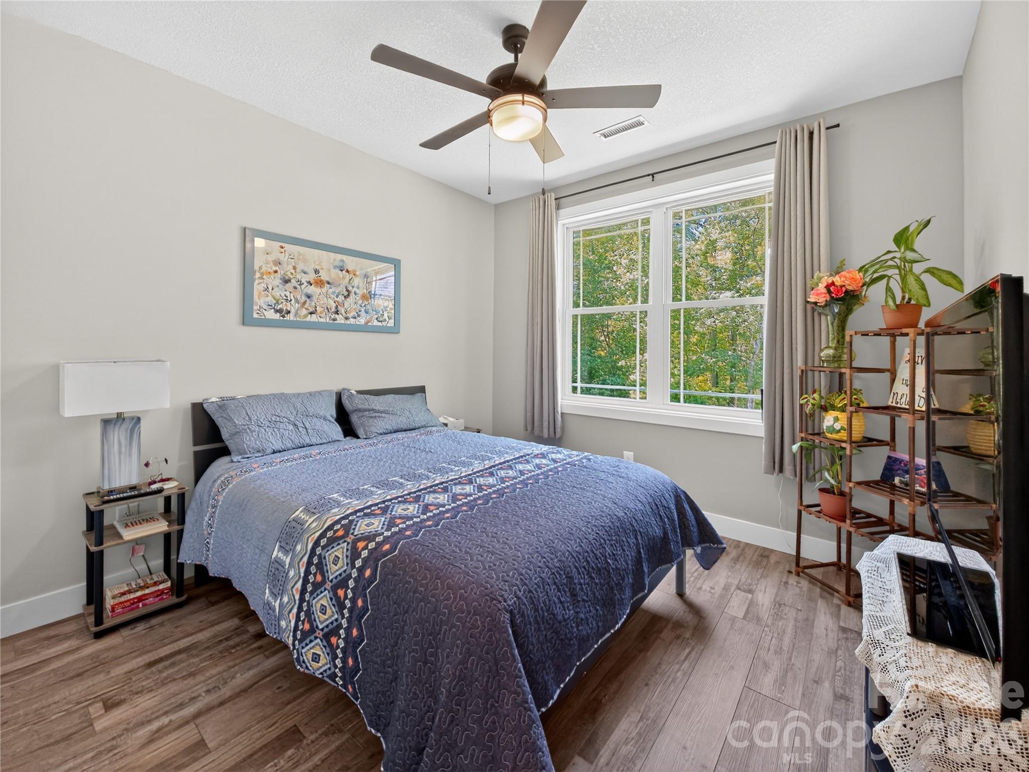 278 Hunters Trace Rutherfordton, NC 28139 - Photo 32 of 33 a bedroom with bed and a window
