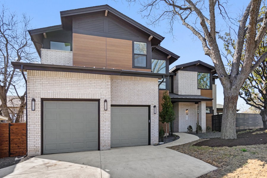 2645 West 45th Street Austin, TX 78731 - Photo 1 of 1 a front view of a house with garden