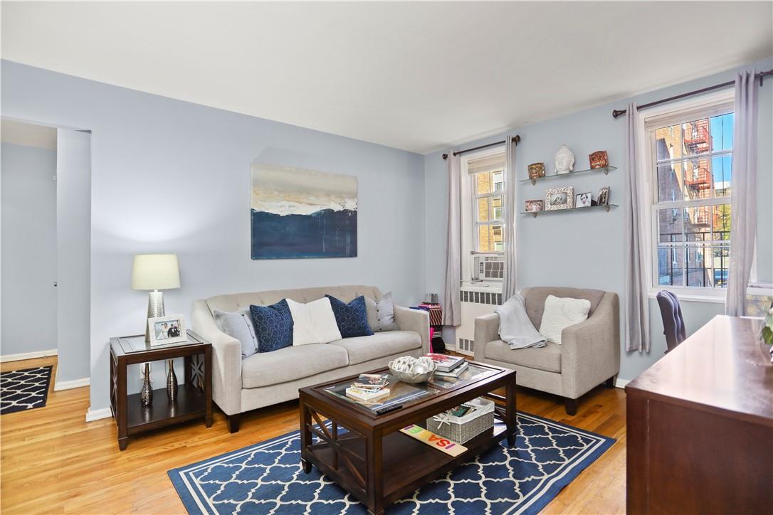 796 Bronx River Road, Unit B25 Bronxville, NY 10708 - Photo 1 of 1 a living room with furniture rug and window