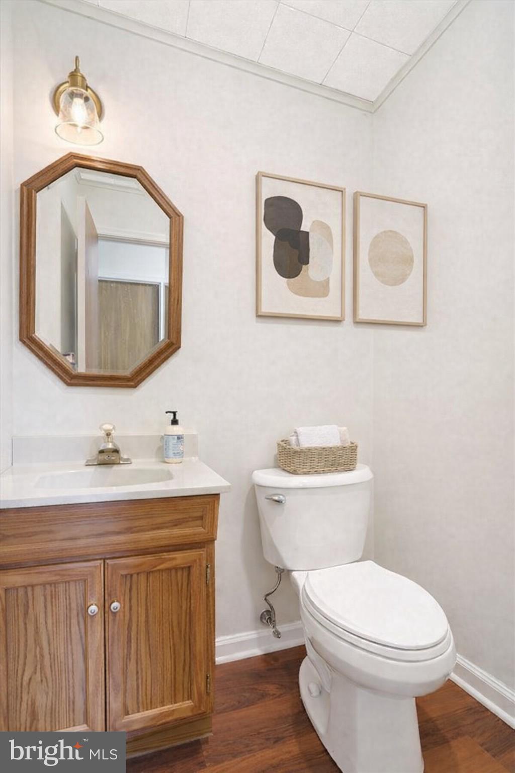 11 Dogwood Lane Manchester, PA 17345 - Photo 16 of 23 a bathroom with a toilet a sink and mirror