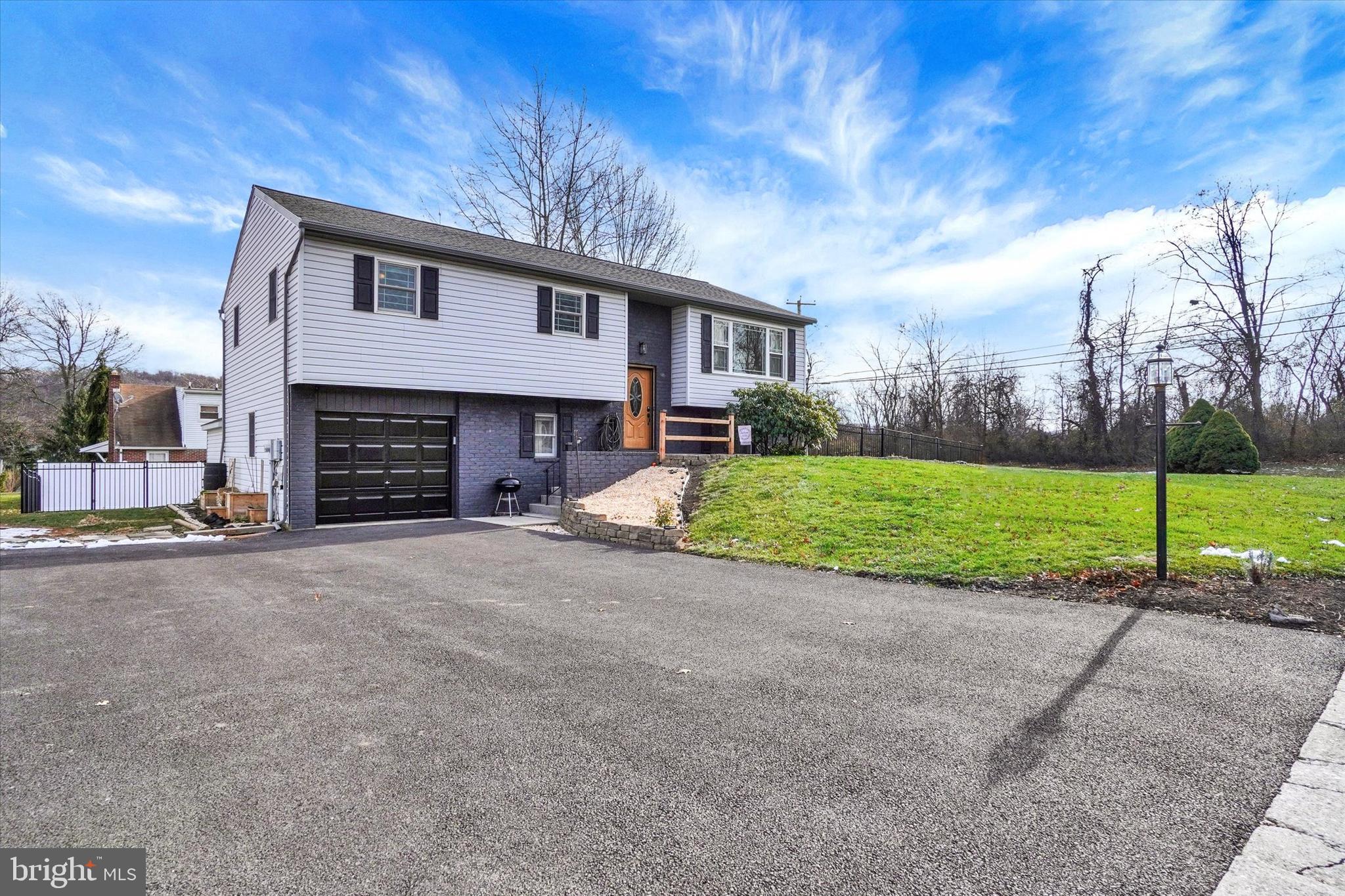 11 Dogwood Lane Manchester, PA 17345 - Photo 18 of 23 a view of a house with a yard and garage