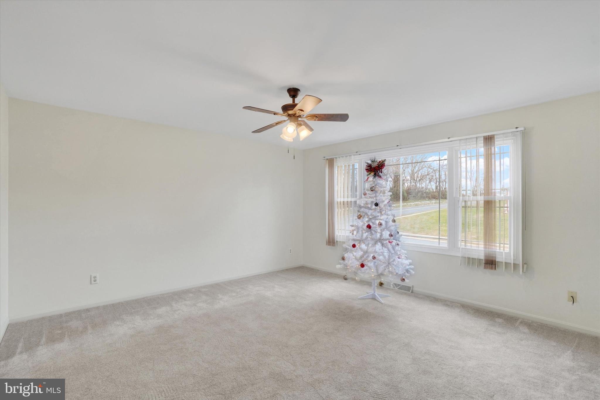 11 Dogwood Lane Manchester, PA 17345 - Photo 4 of 23 wooden floor in an empty room with a window
