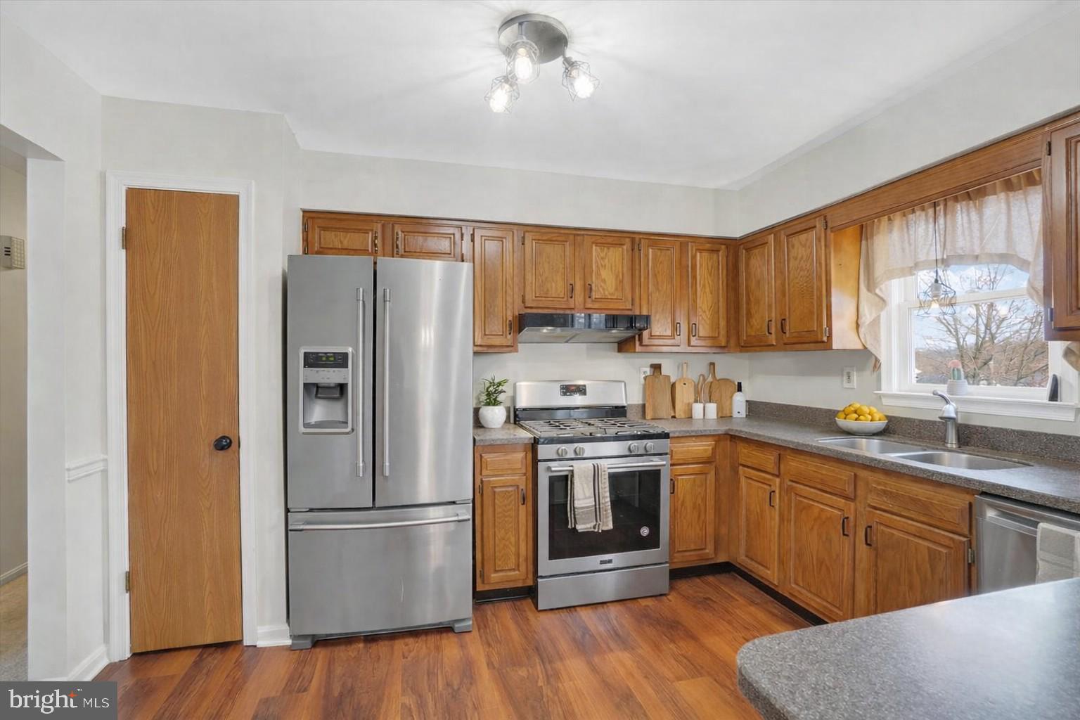 11 Dogwood Lane Manchester, PA 17345 - Photo 7 of 23 a kitchen with a refrigerator stove and sink