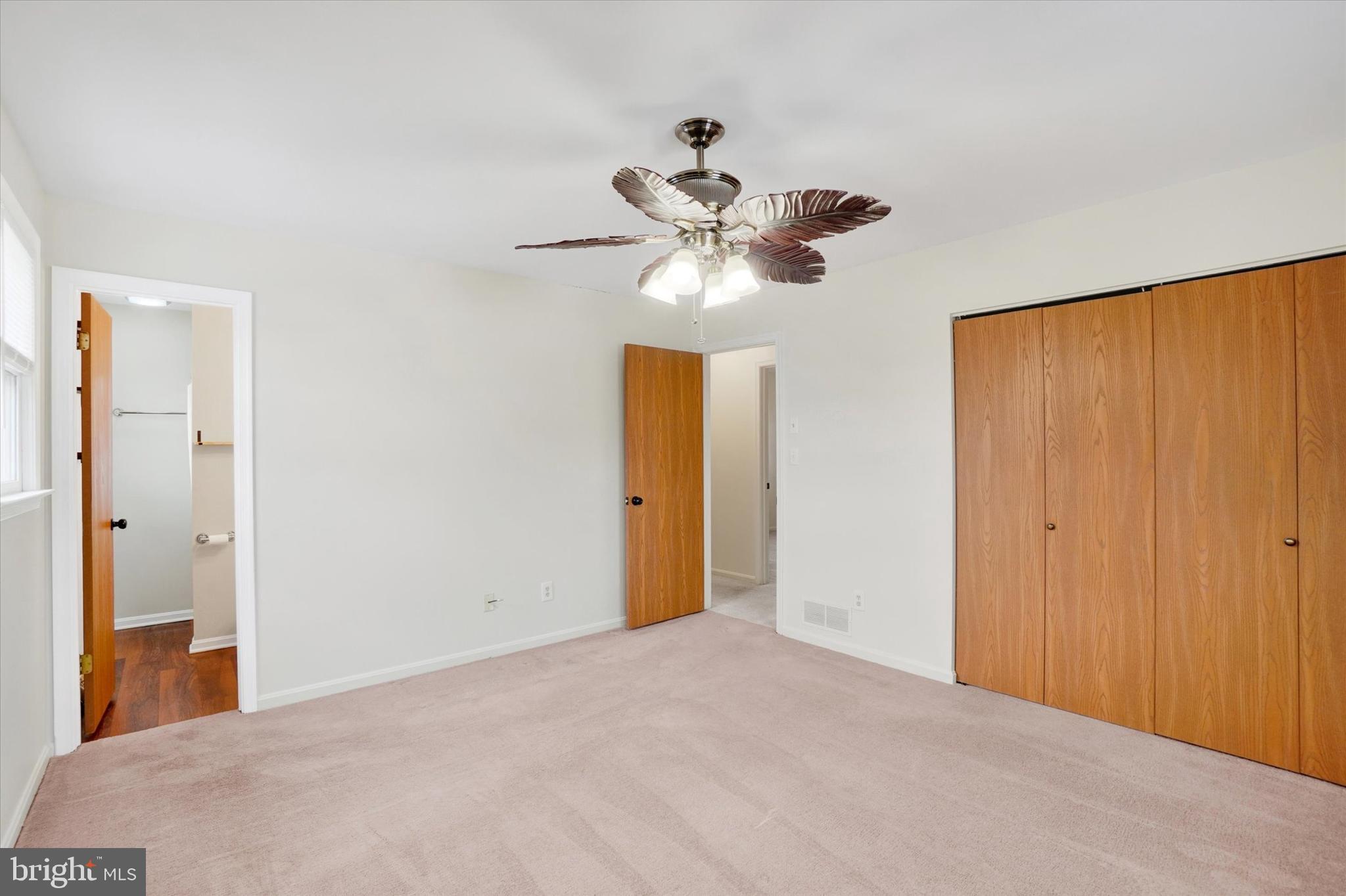 11 Dogwood Lane Manchester, PA 17345 - Photo 10 of 23 a view of a room with a chandelier fan and closet