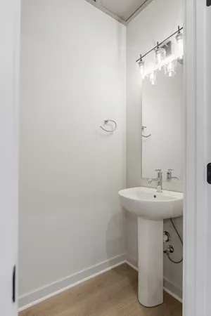 a bathroom with a sink and mirror