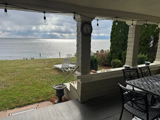 a kitchen with stainless steel appliances granite countertop a stove a refrigerator and a microwave