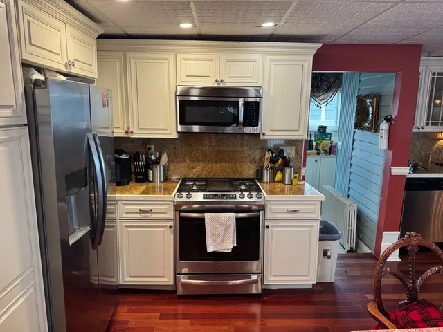 a bathroom with a toilet and a sink