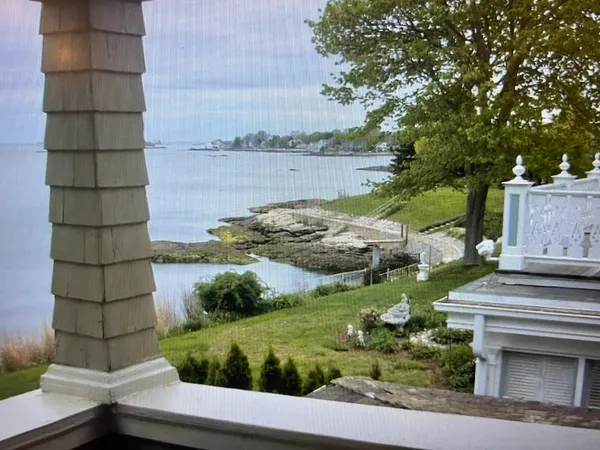 a kitchen with stainless steel appliances granite countertop a stove a refrigerator and a microwave