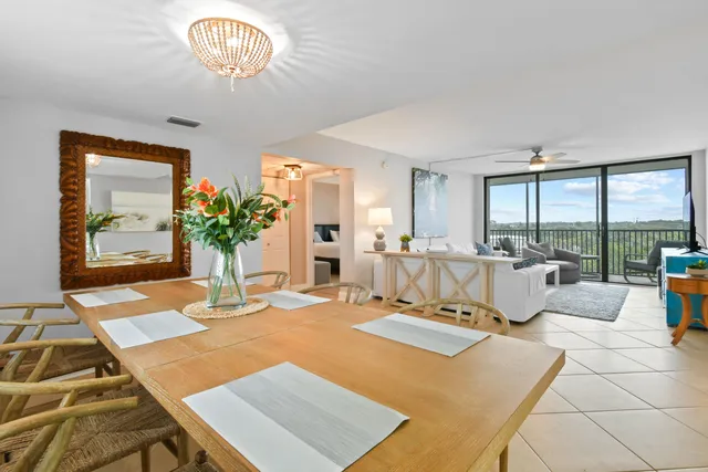 a kitchen with stainless steel appliances a refrigerator and a stove top oven
