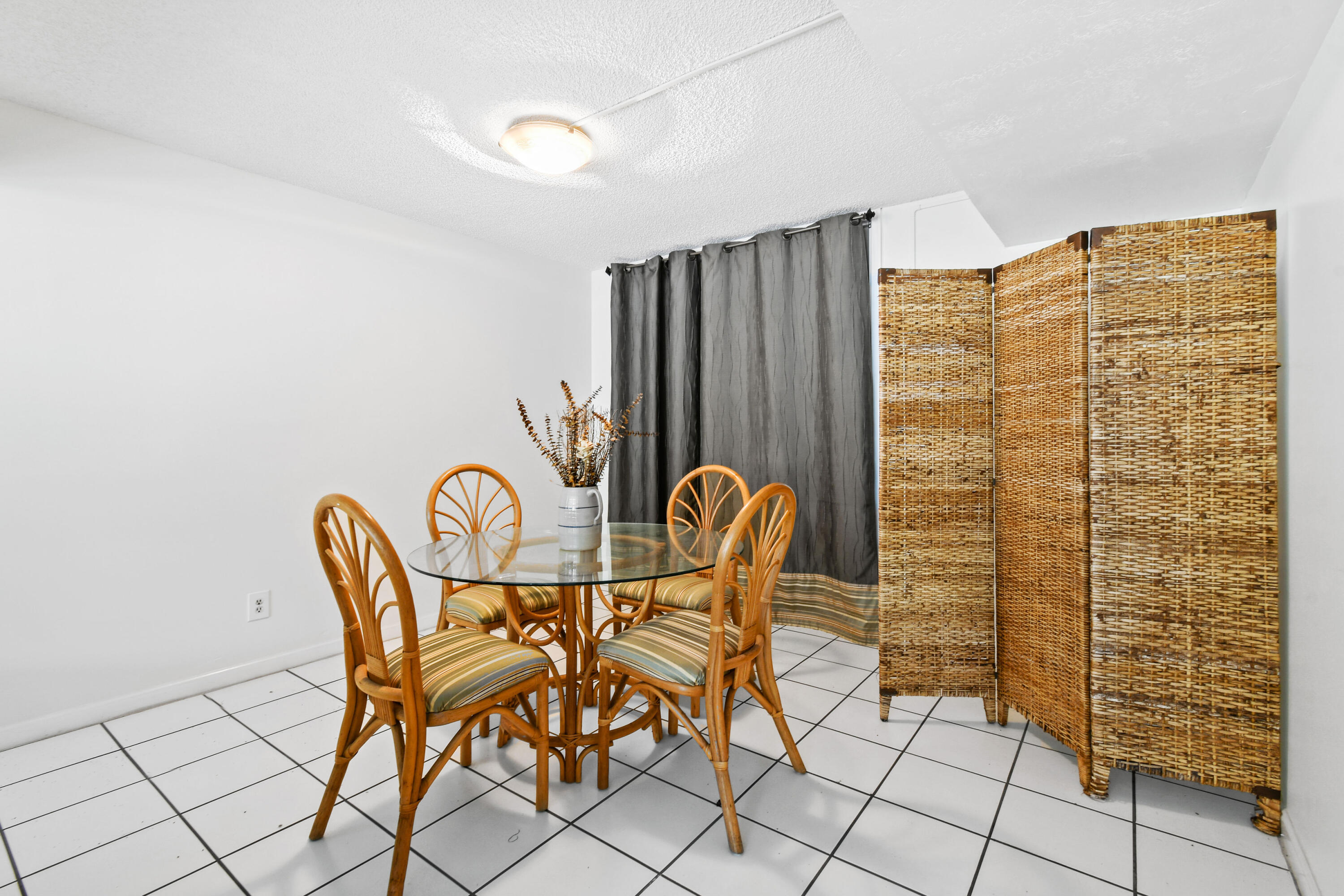 1605 Highway 1, Unit M1404 Jupiter, FL 33477 - Photo 5 of 42 a view of a room with table and chairs