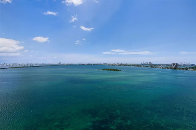 a view of a swimming pool with a lounge chair
