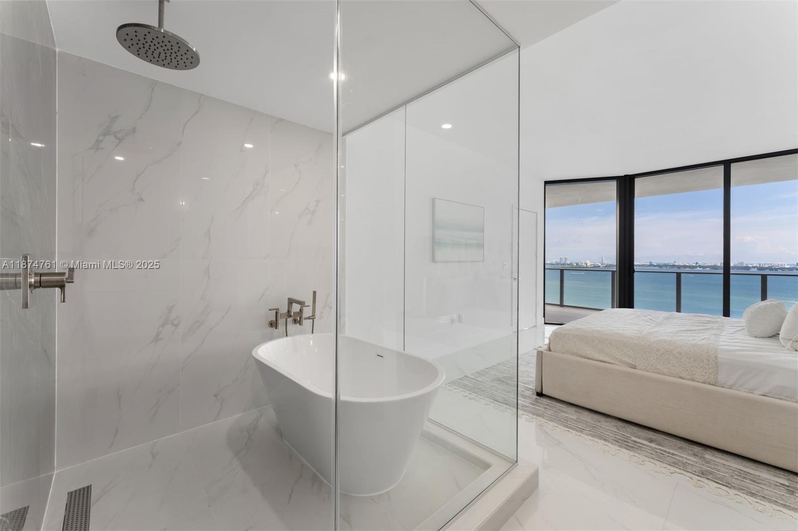 700 Northeast 24th Street, Unit 2201 Miami, FL 33137 - Photo 8 of 20 a bathroom with a bathtub and a sink