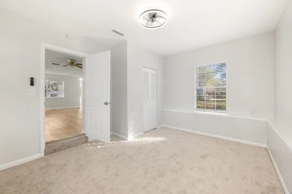 an empty room with windows