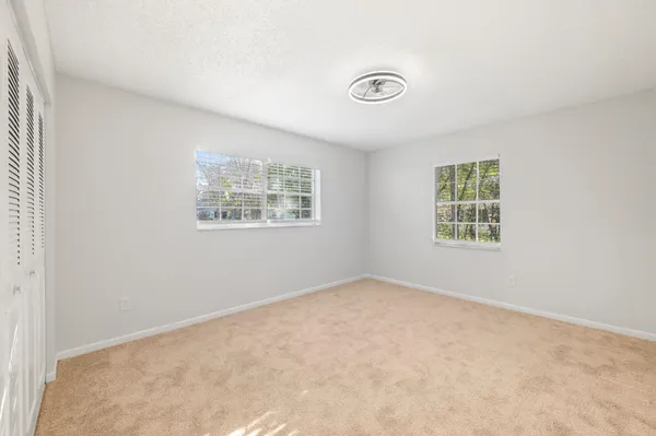 an empty room with windows