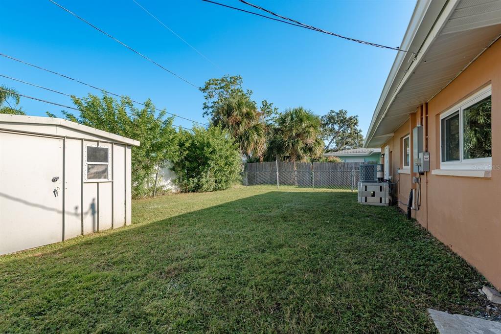 2480 Del Rio Way Dunedin, FL 34698 - Photo 25 of 35 a view of a back yard