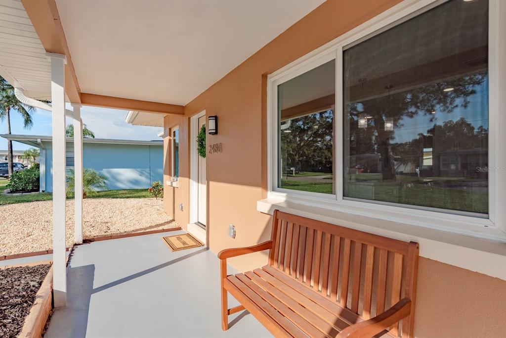 2480 Del Rio Way Dunedin, FL 34698 - Photo 4 of 35 a view of a two chair in the balcony