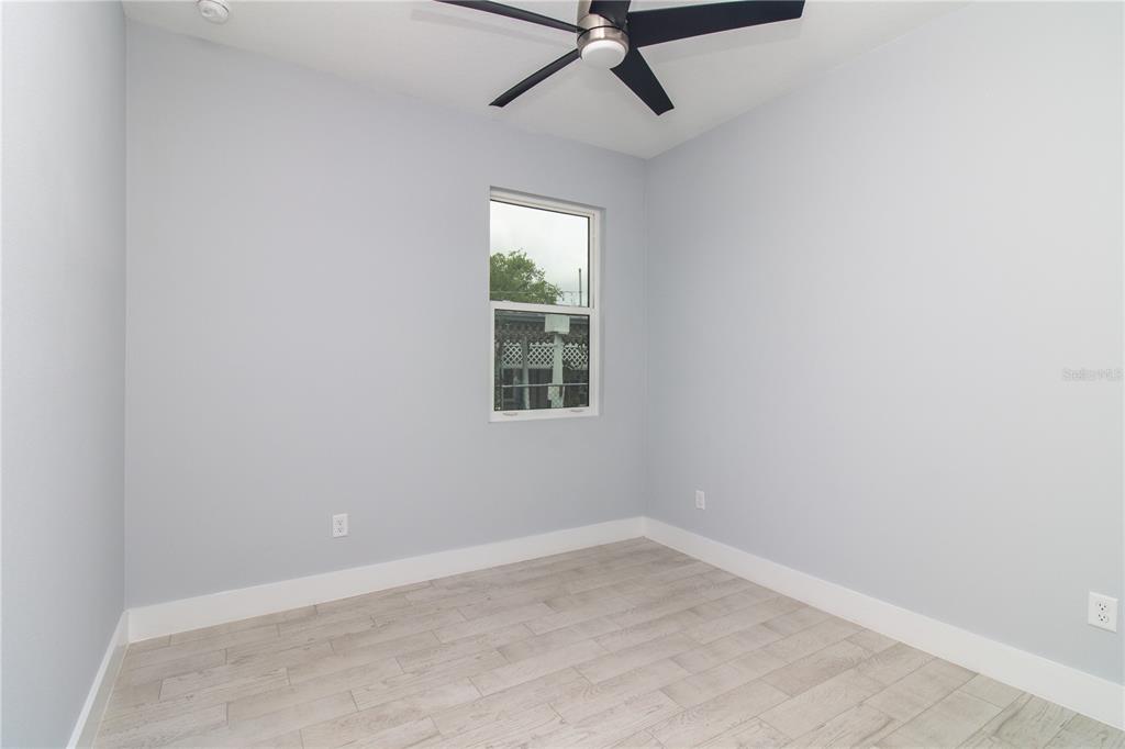 113 Douglas Street Edgewater, FL 32141 - Photo 13 of 39 an empty room with a window