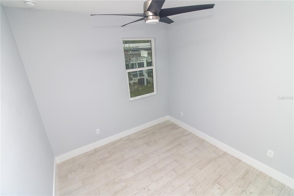 113 Douglas Street Edgewater, FL 32141 - Photo 14 of 39 an empty room with a window