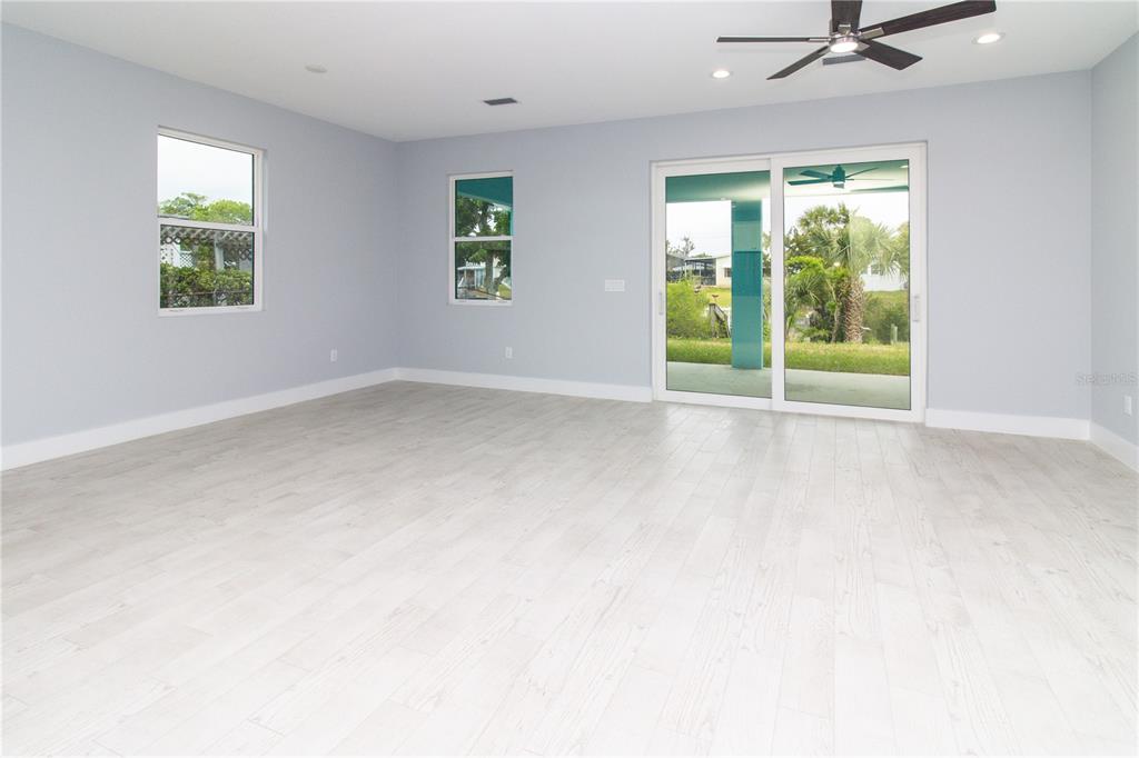 113 Douglas Street Edgewater, FL 32141 - Photo 21 of 39 an empty room with windows