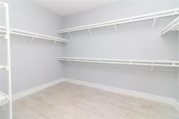 a view of a room with racks on the wall