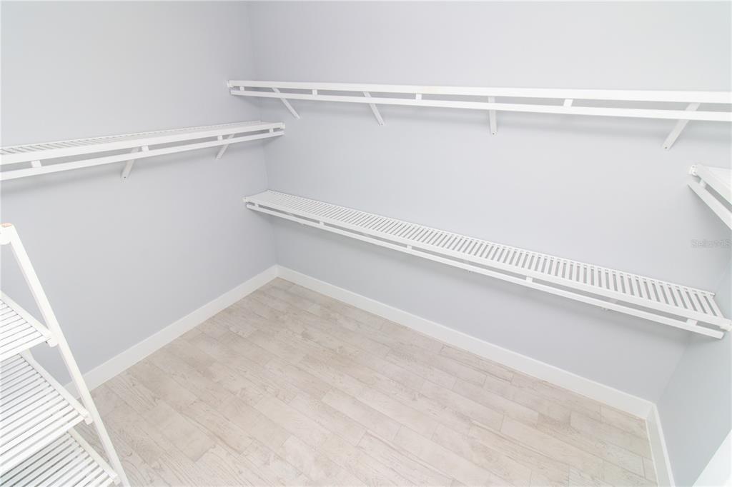 113 Douglas Street Edgewater, FL 32141 - Photo 28 of 39 a view of a room with racks on the wall