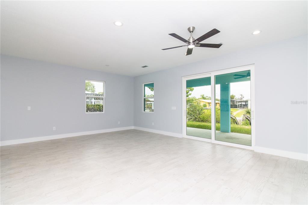 113 Douglas Street Edgewater, FL 32141 - Photo 29 of 39 a view of an empty room with a window