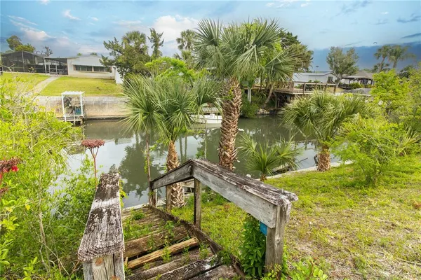 an aerial view of house with a yard swimming pool and outdoor seating