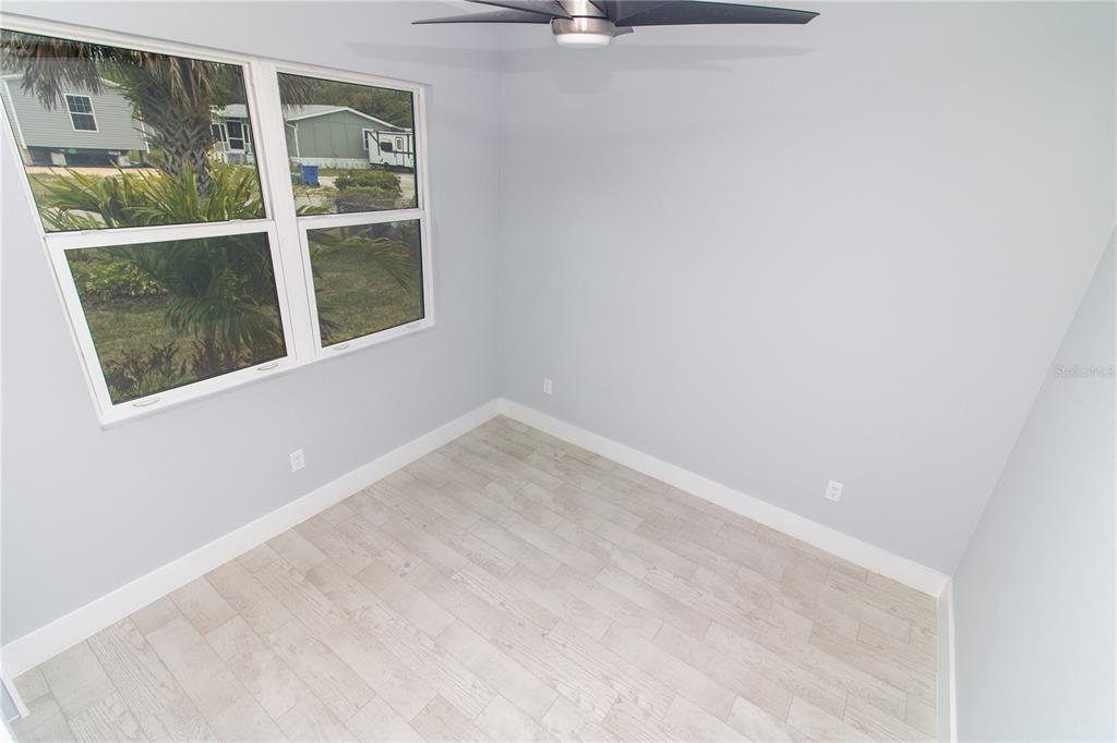 113 Douglas Street Edgewater, FL 32141 - Photo 10 of 39 an empty room with a window