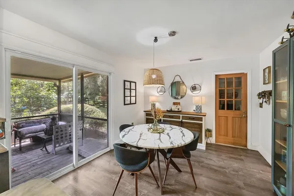 a view of a dining room with furniture