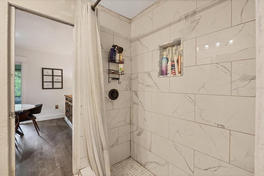 18155 Highway 62 Parrish, FL 34219 - Photo 26 of 61 a bathroom with a shower