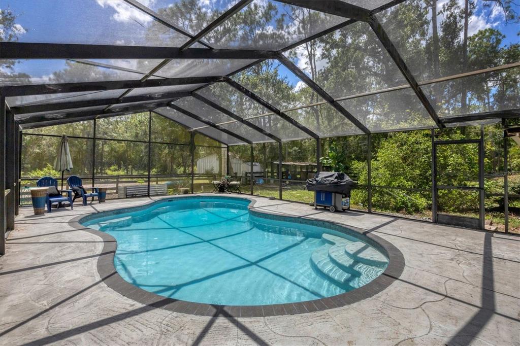 18155 Highway 62 Parrish, FL 34219 - Photo 36 of 61 a view of a swimming pool with a patio