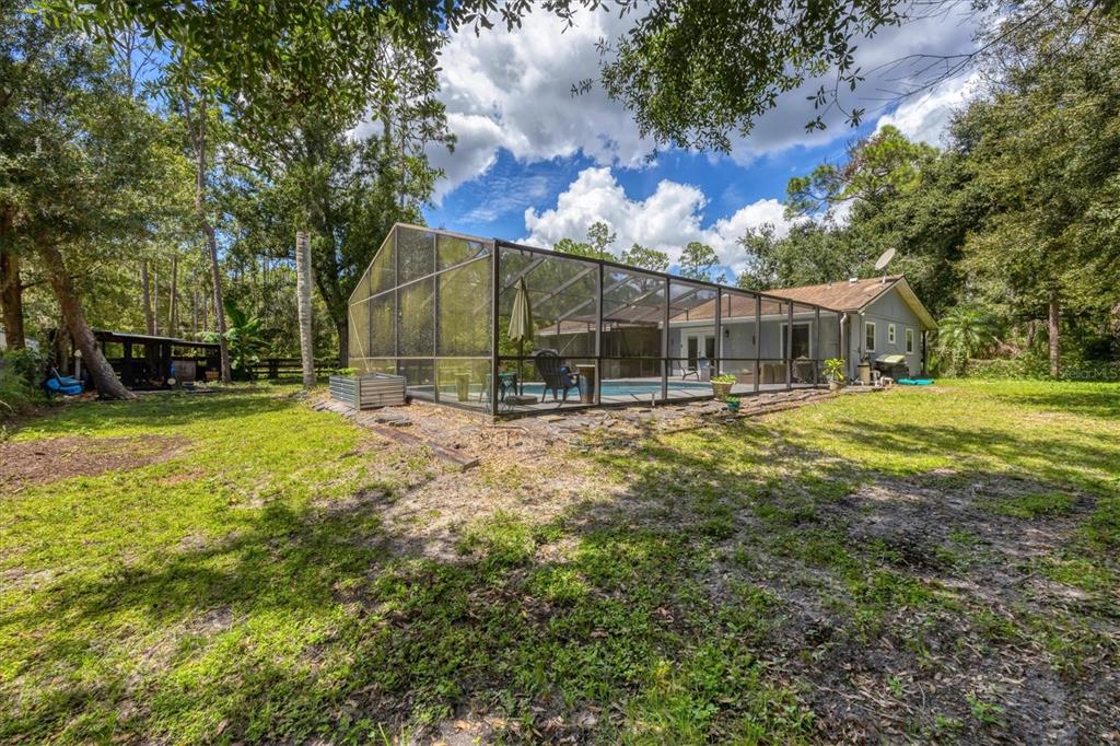 18155 Highway 62 Parrish, FL 34219 - Photo 41 of 61 a view of a yard with a house in the background