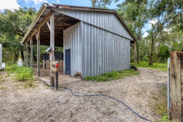 a view of a lake with a house in the background