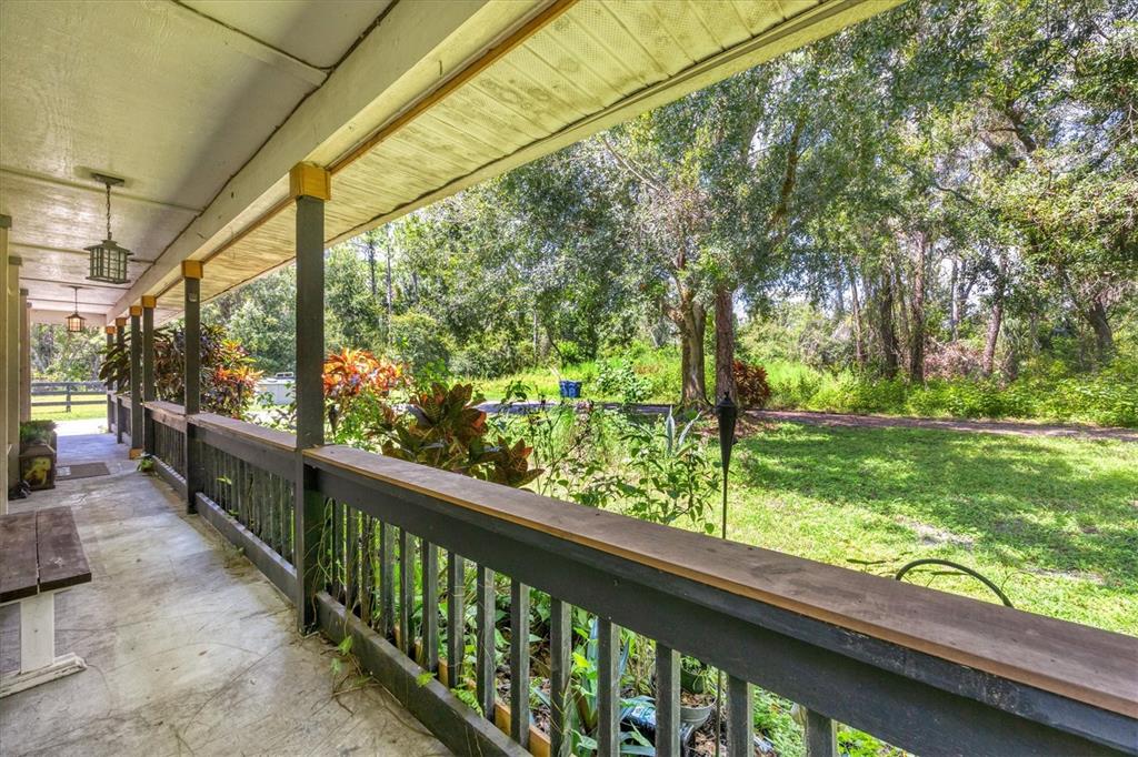 18155 Highway 62 Parrish, FL 34219 - Photo 8 of 61 a view of outdoor space with deck and yard