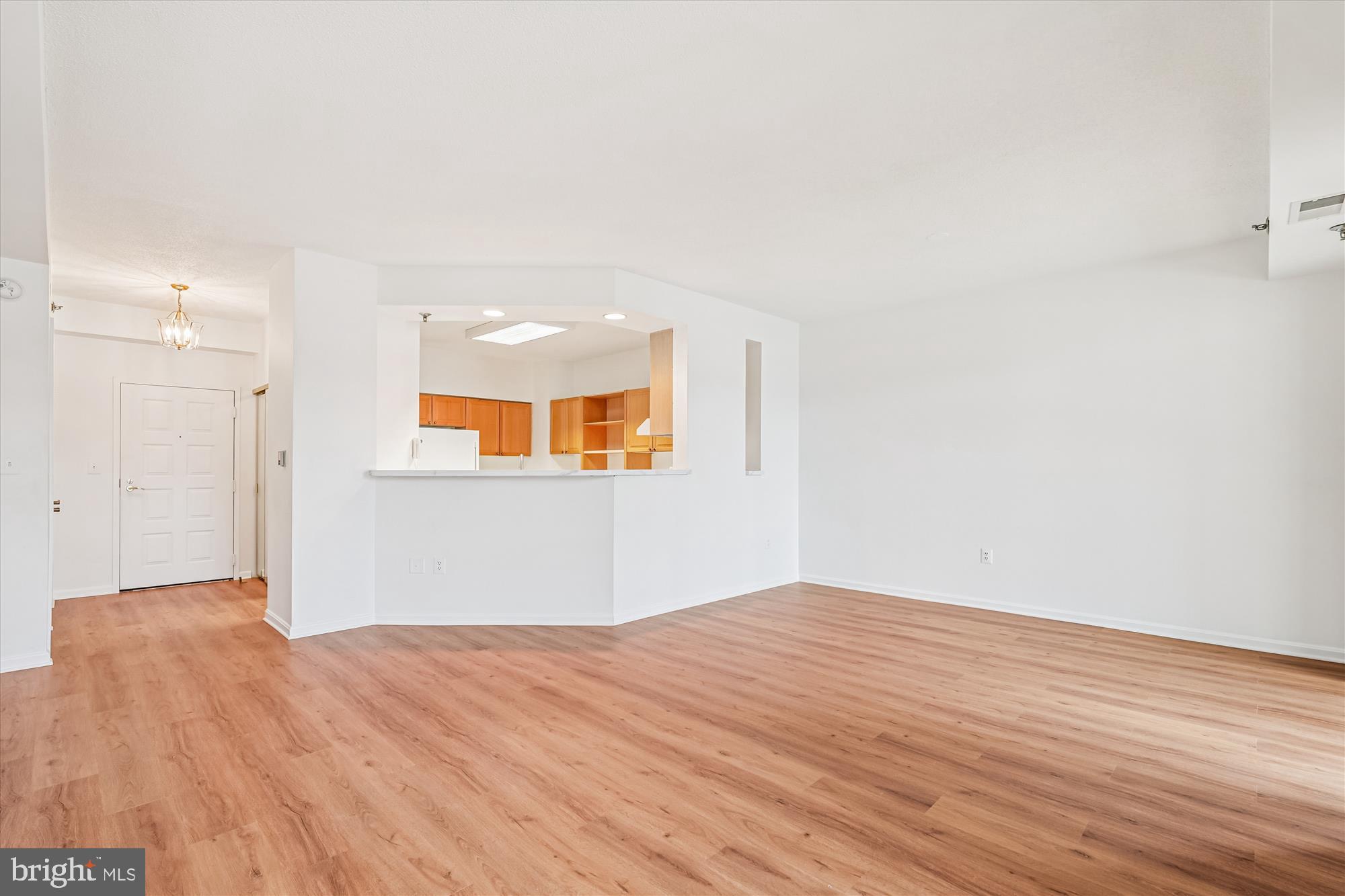 3210 North Leisure World Boulevard, Unit 119 Silver Spring, MD 20906 - Photo 20 of 76 a view of empty room with wooden floor
