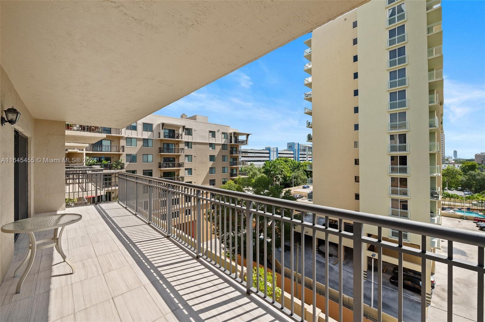 3530 Southwest 22nd Street, Unit 713 Miami, FL 33145 - Photo 14 of 41 a view of balcony with a potted plant