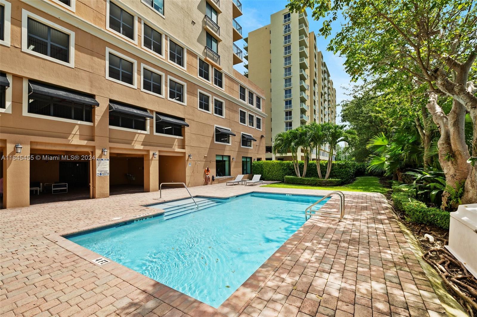 3530 Southwest 22nd Street, Unit 713 Miami, FL 33145 - Photo 5 of 41 a view of building with yard