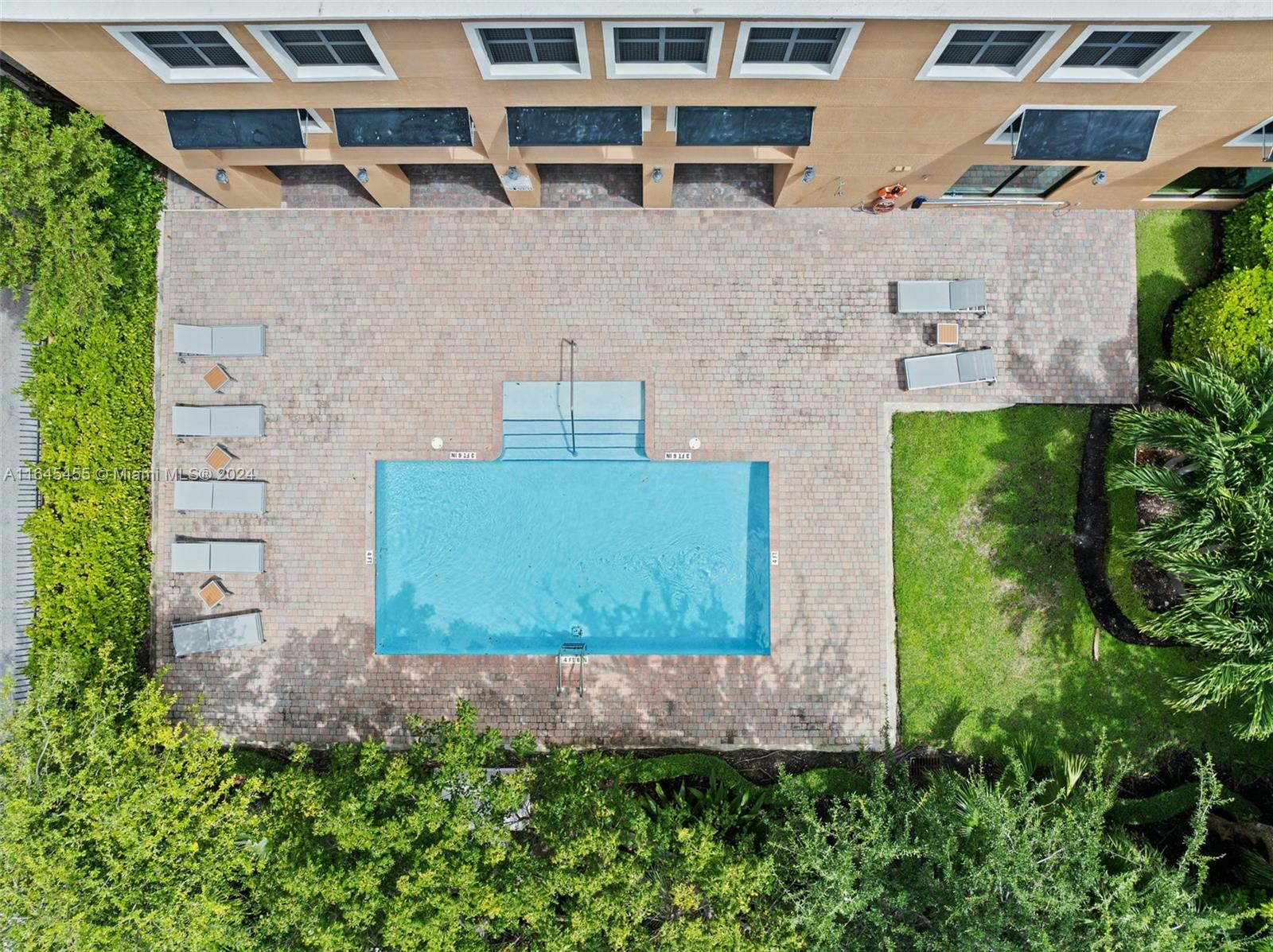 3530 Southwest 22nd Street, Unit 713 Miami, FL 33145 - Photo 6 of 41 an aerial view of a house with a yard and garden