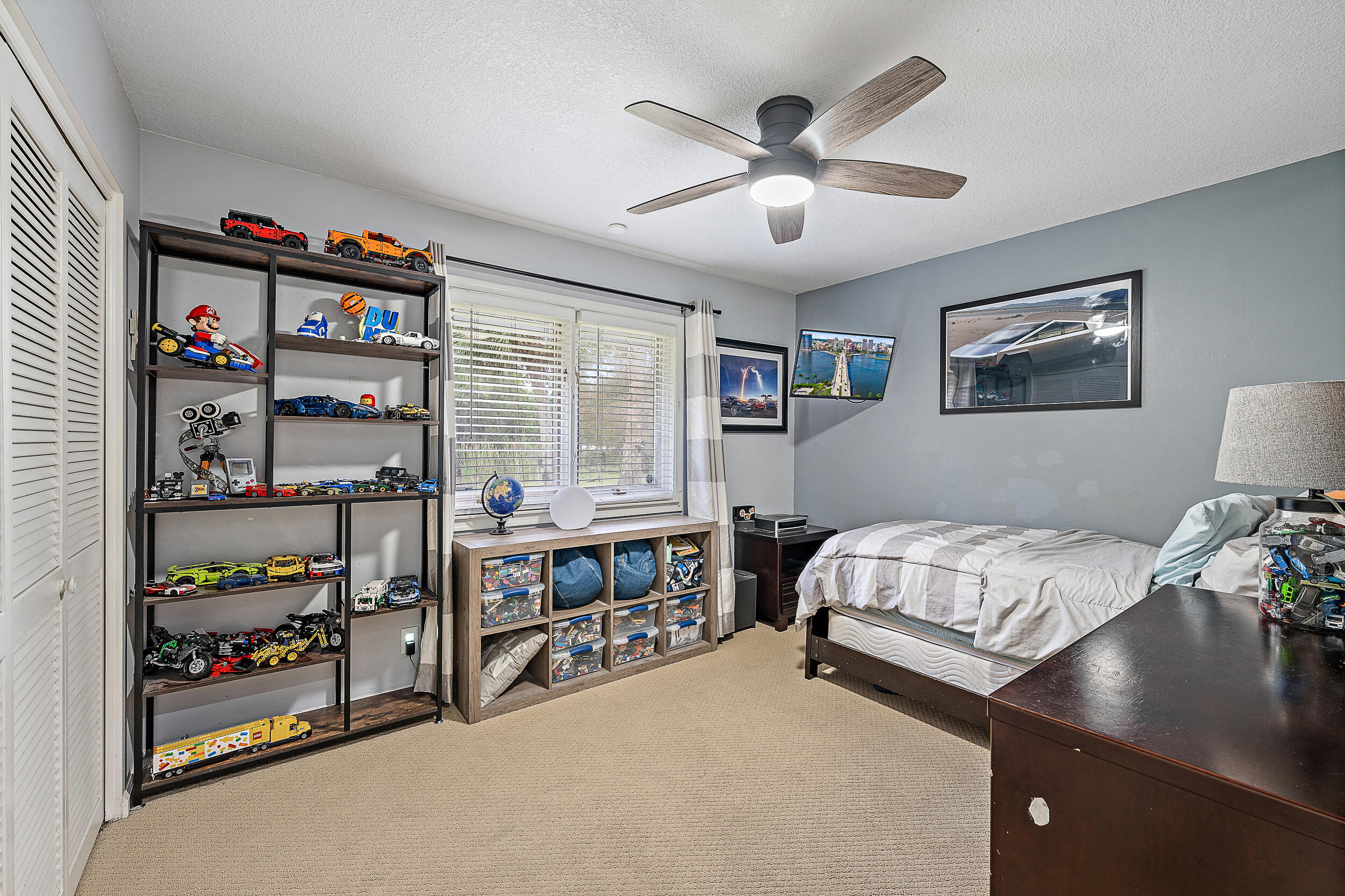 17696 Winterhawk Trail Jupiter, FL 33478 - Photo 11 of 21 a bedroom with bed and a window