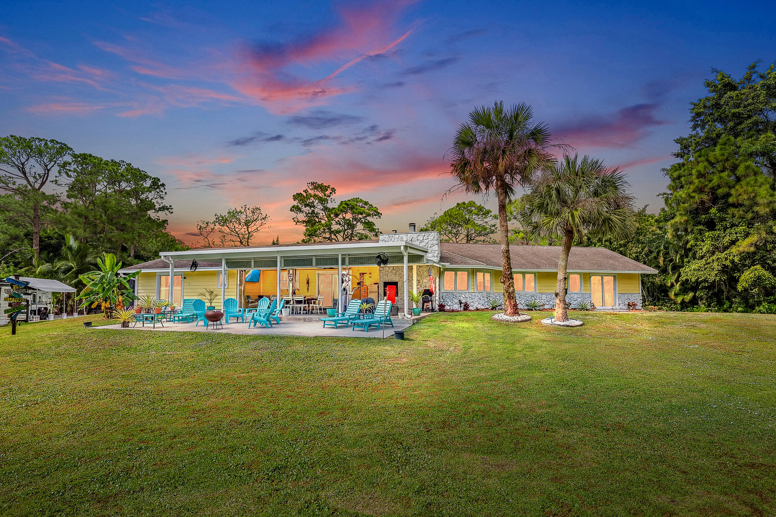 17696 Winterhawk Trail Jupiter, FL 33478 - Photo 3 of 21 a view of a house with a big yard