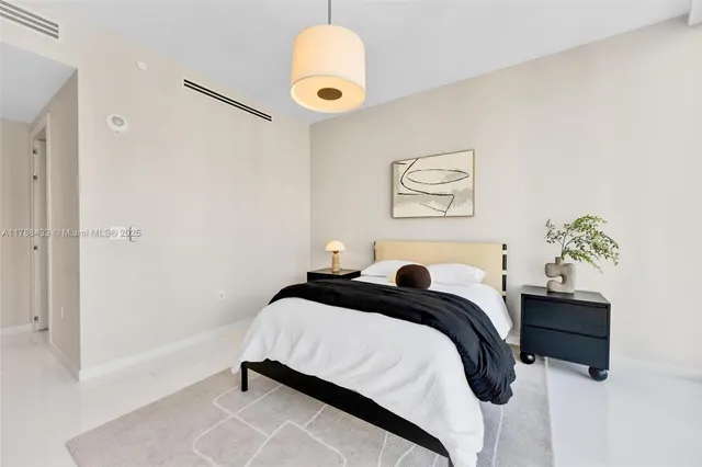 a view of a hallway with stairs