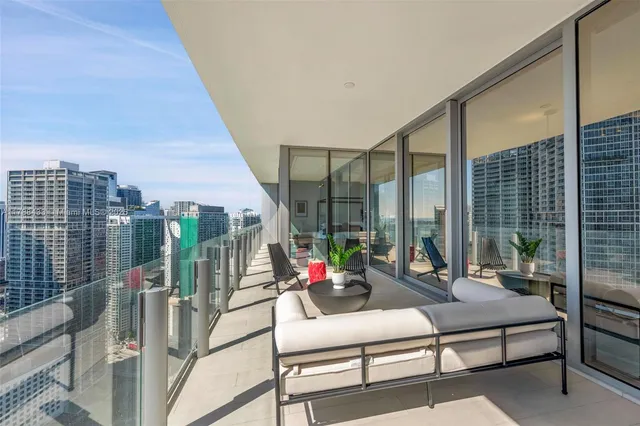 a view of a city and ocean