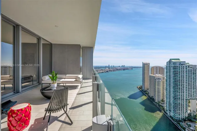 a bathroom with a toilet sink and shower