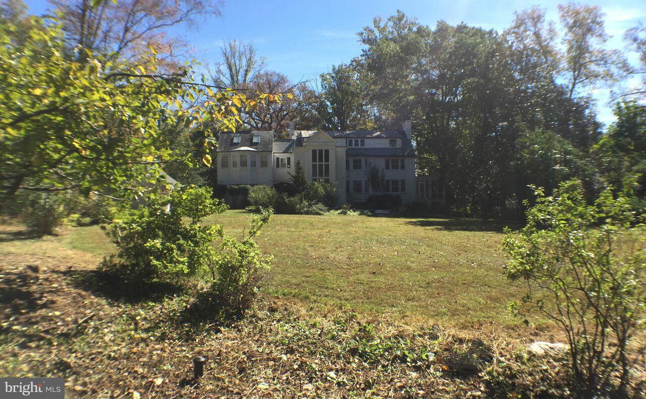 9108 Burning Tree Road Bethesda, MD 20817 - Photo 15 of 15 a view of a yard with large trees
