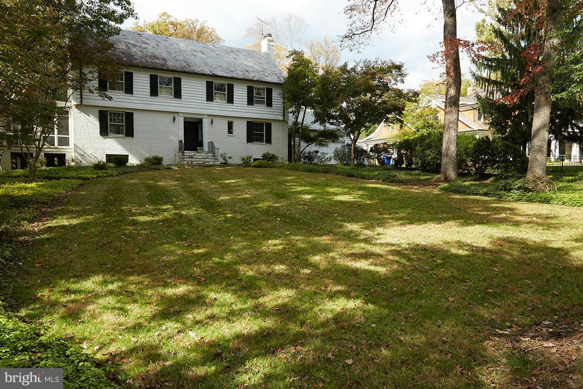 9108 Burning Tree Road Bethesda, MD 20817 - Photo 3 of 15 a view of a house with a swimming pool