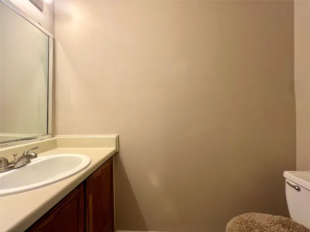a bathroom with a sink and a toilet