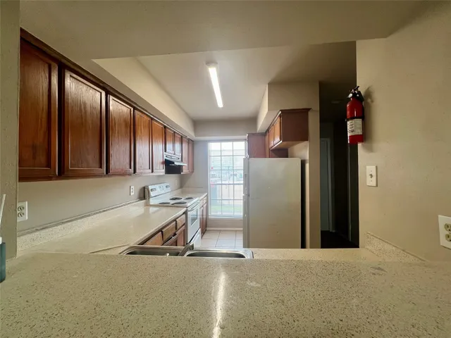 a room with a table and chairs