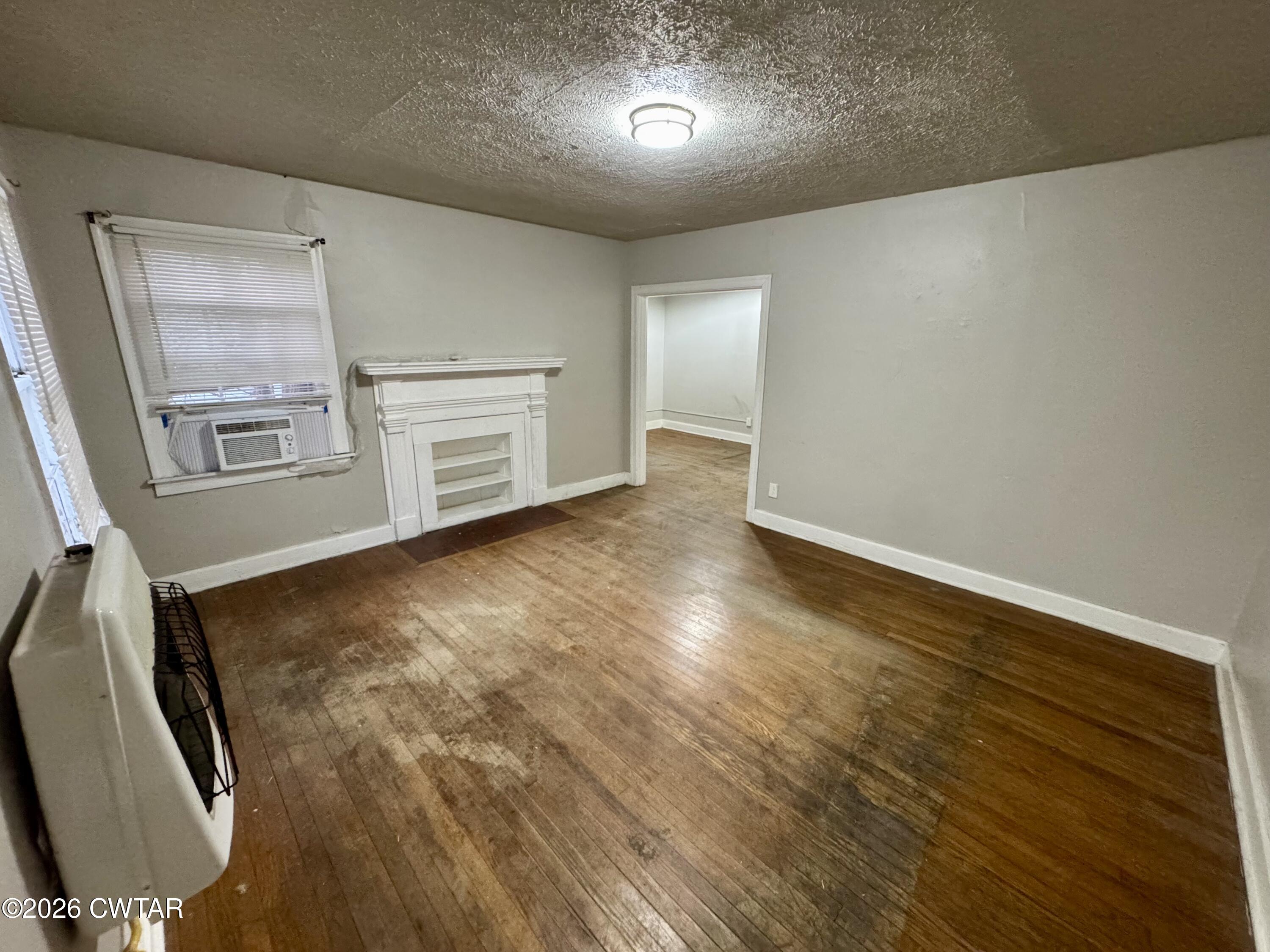 125 South Fairgrounds Street Jackson, TN 38301 - Photo 4 of 15 an empty room with windows