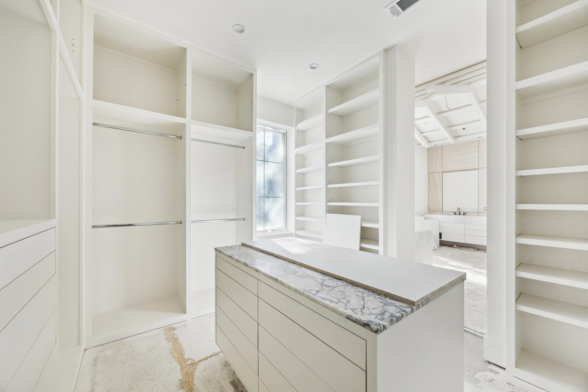 4152 Coleridge Street West University Place, TX 77005 - Photo 18 of 29 Primary Closet with a Center Packing Island.