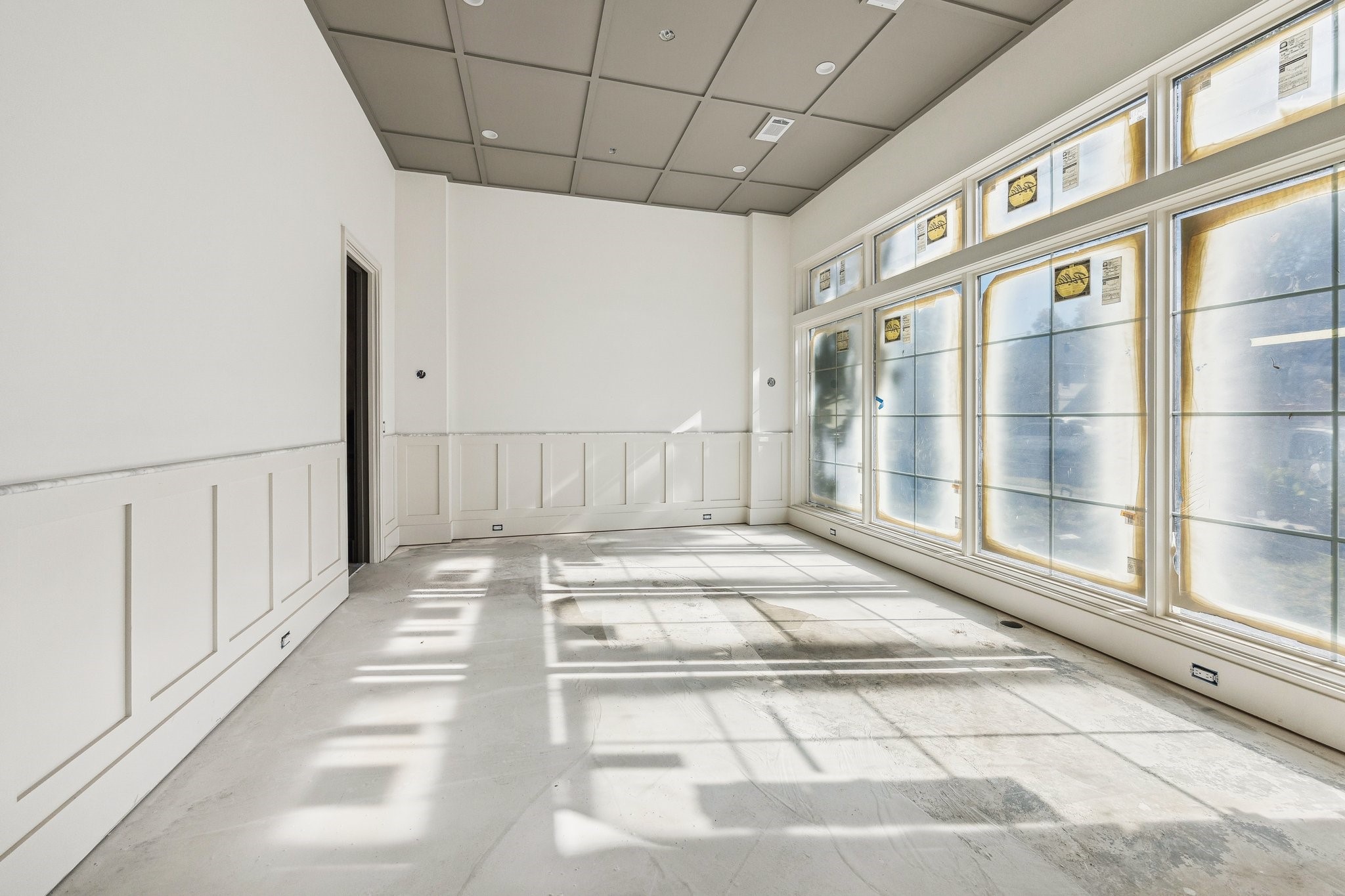 4152 Coleridge Street West University Place, TX 77005 - Photo 4 of 29 Large formal dinining room with wainscoting panels and unique ceiling detail.